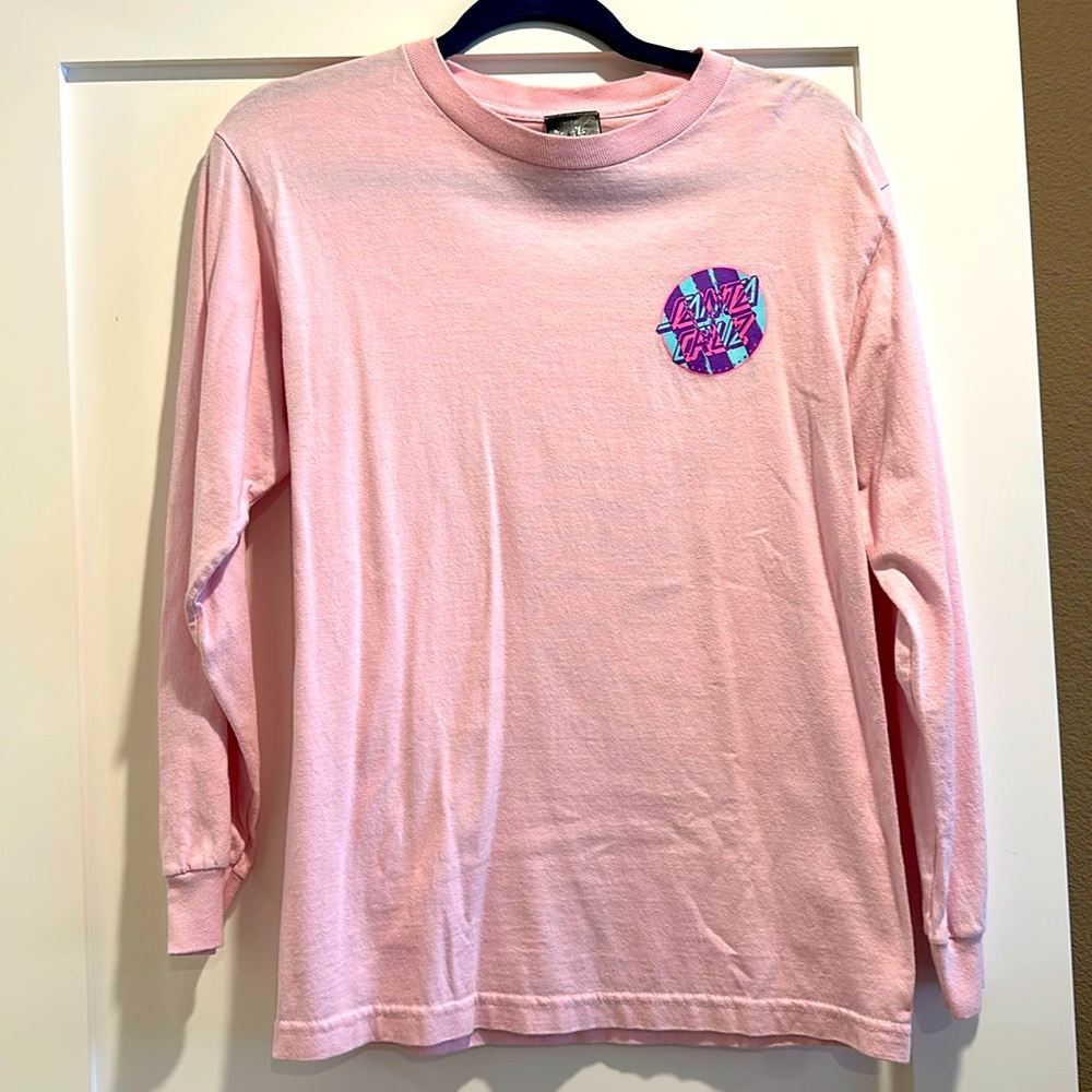 Light pink, women’s size small graphics Santa Cruz long sleeve shirt.